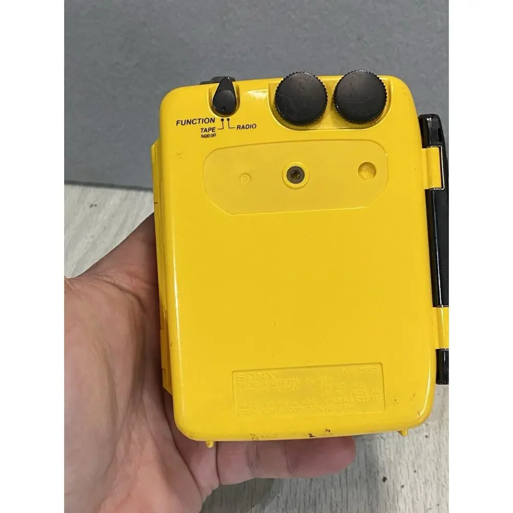 Vintage Sony WM-AF54 WalkMan Sport Radio Cassette Player Portable Yellow WORKS